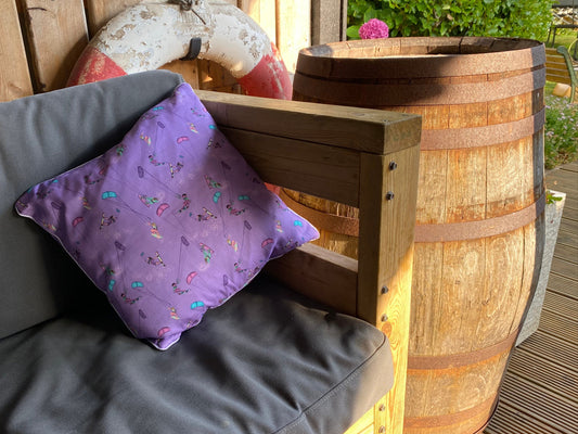 Purple 40x40 cushion on outdoor bench