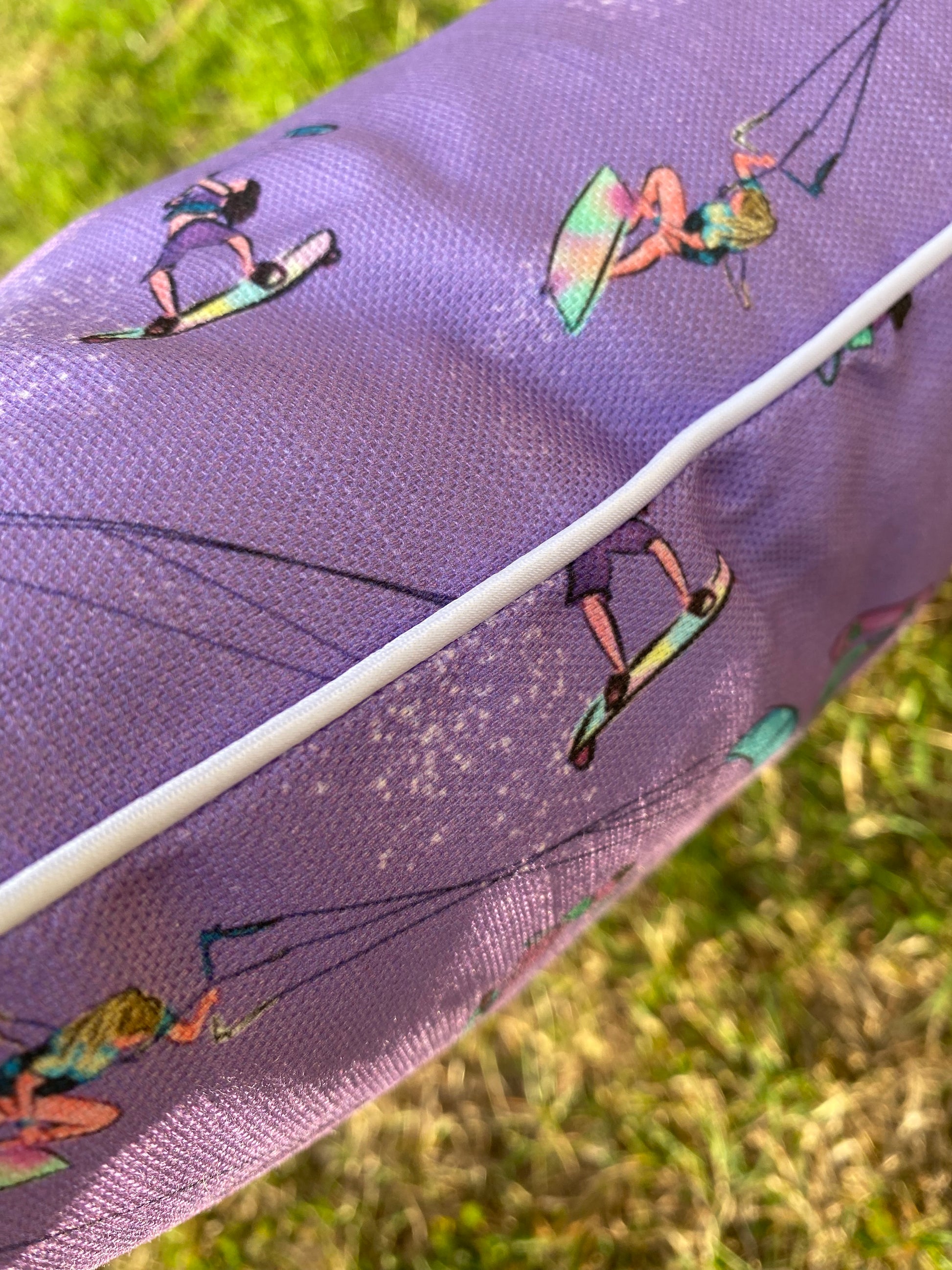 Purple 40x40 cushion on grass